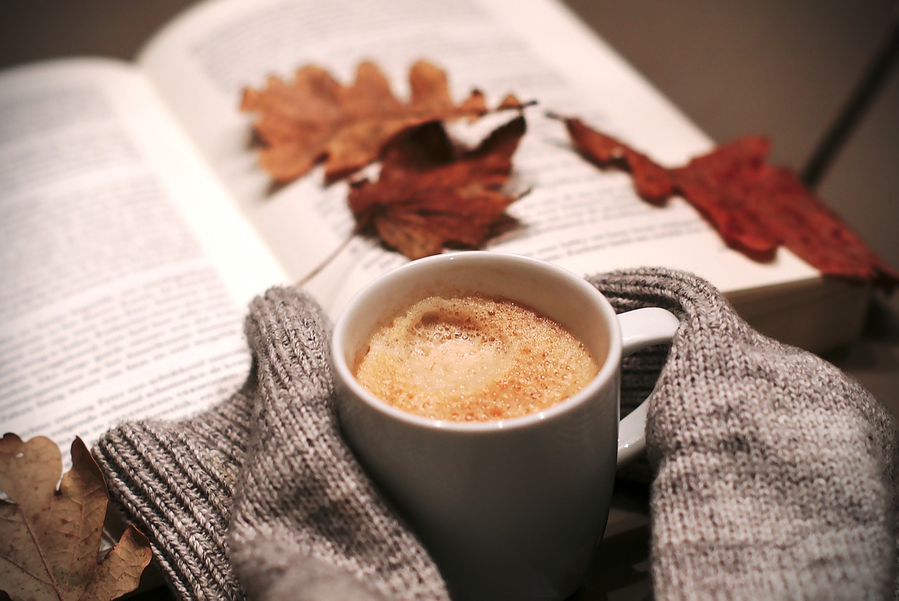 Person holding hot beverage